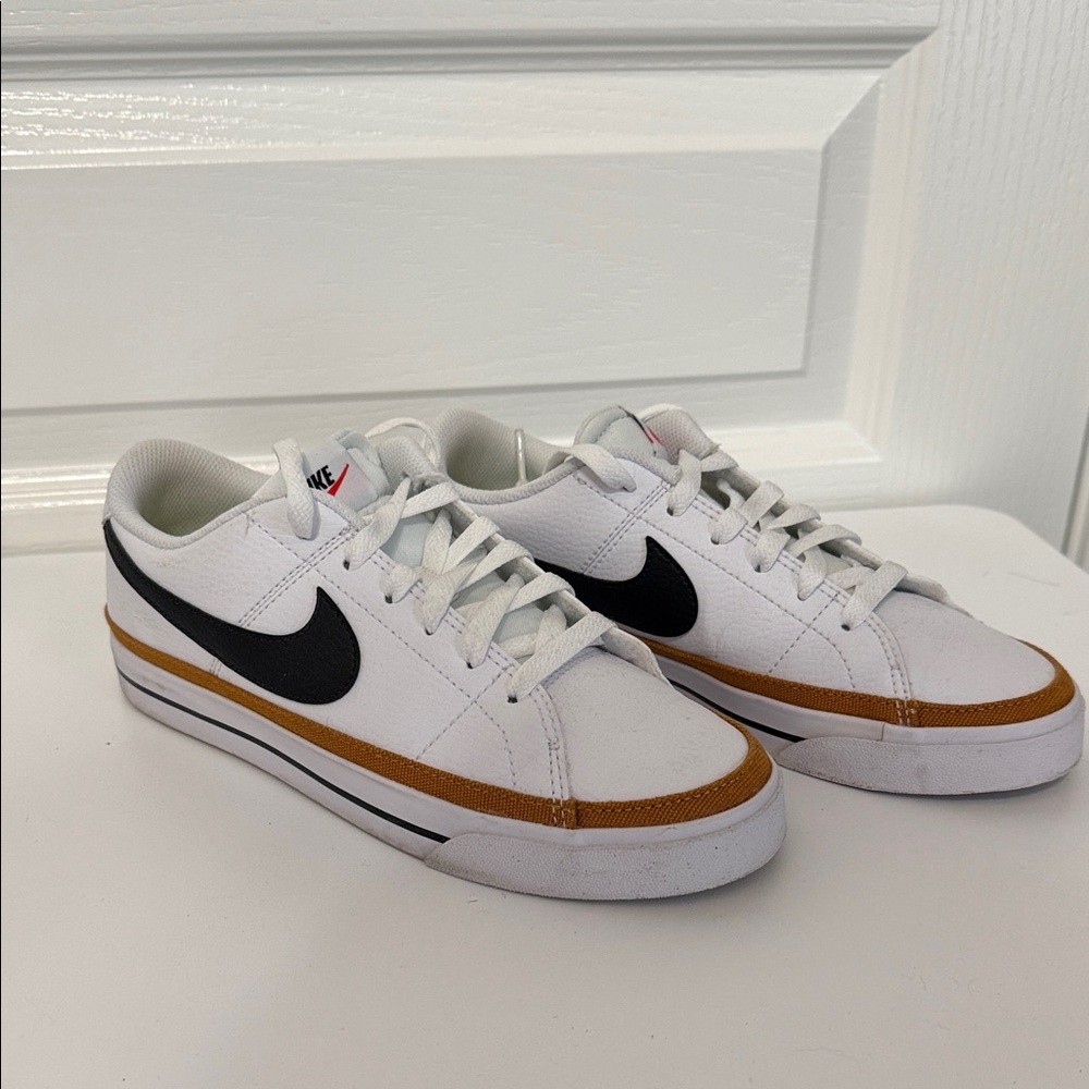 Nike Women’s White and Black Sneakers